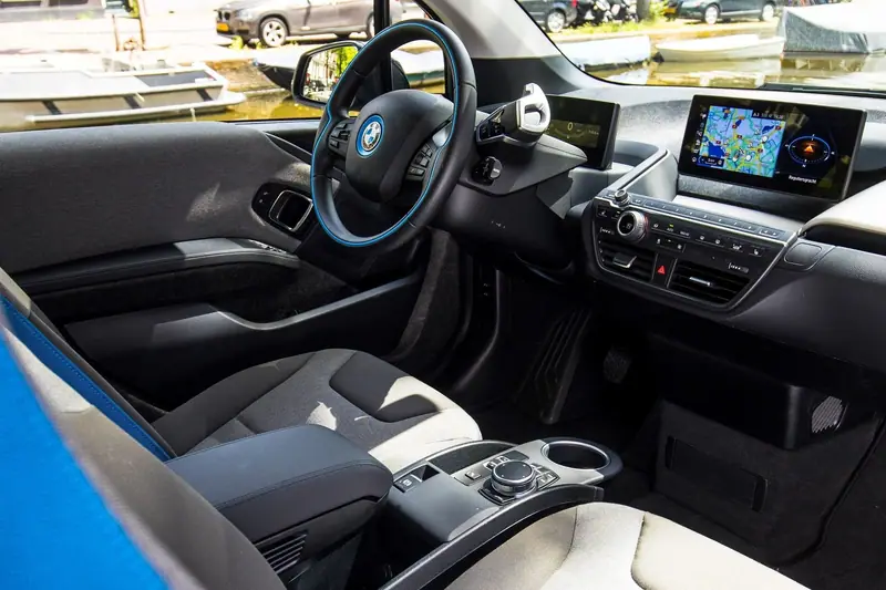 BMW i3 cockpit after an interior detail: dash, seats and screens wiped clean
