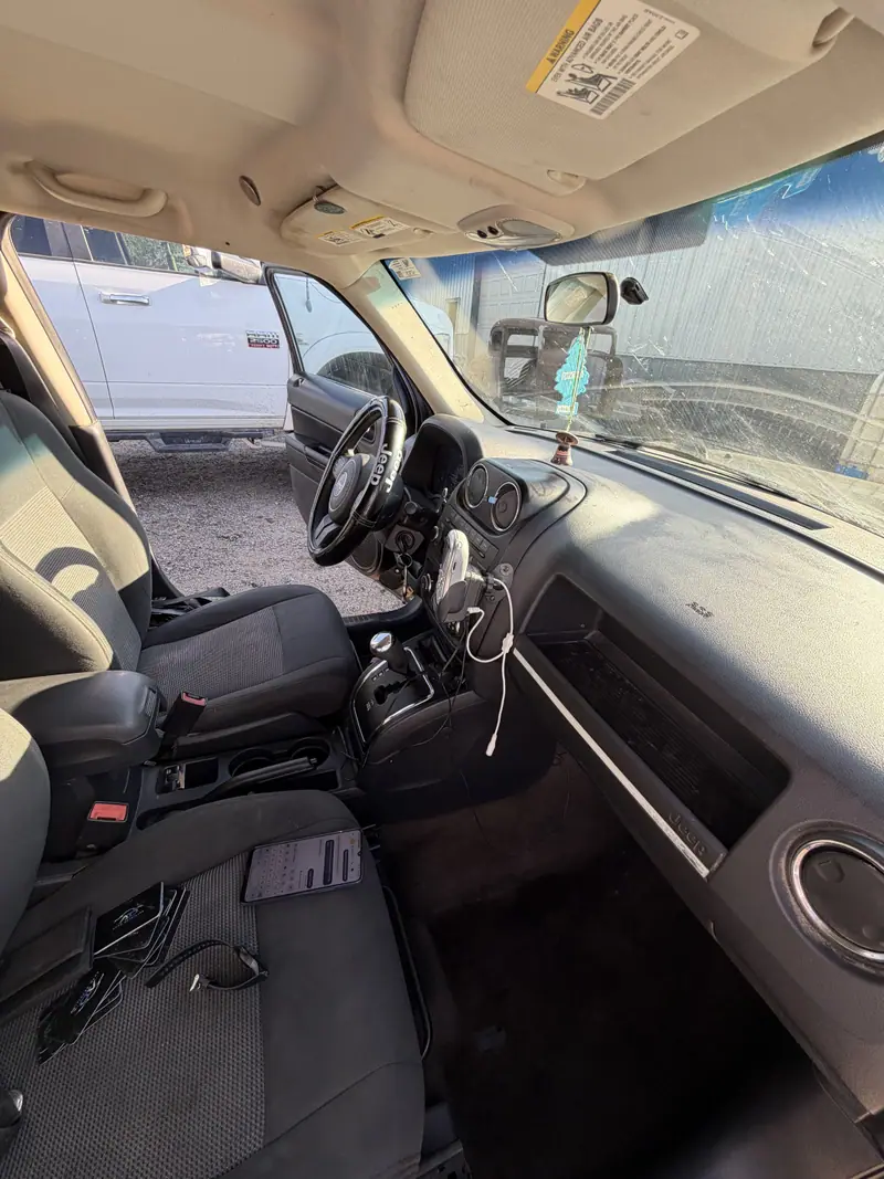 Jeep dashboard, console and driver seat wiped down and detailed