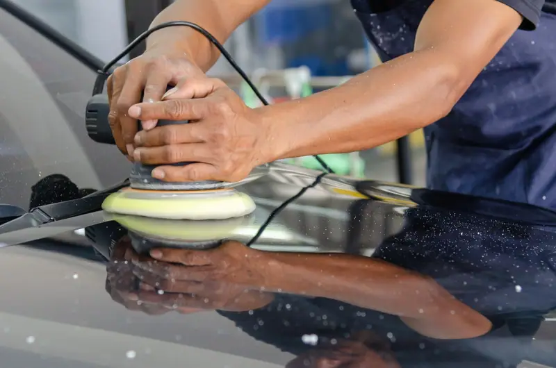 Polishing pad working across dark paint